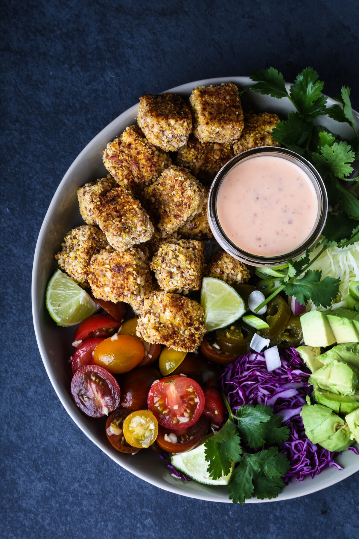 A bowl of vegan bang bang tofu.