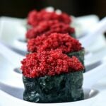 Vegan caviar made with amaranth grain and beet juice, served gunkan maki-style.