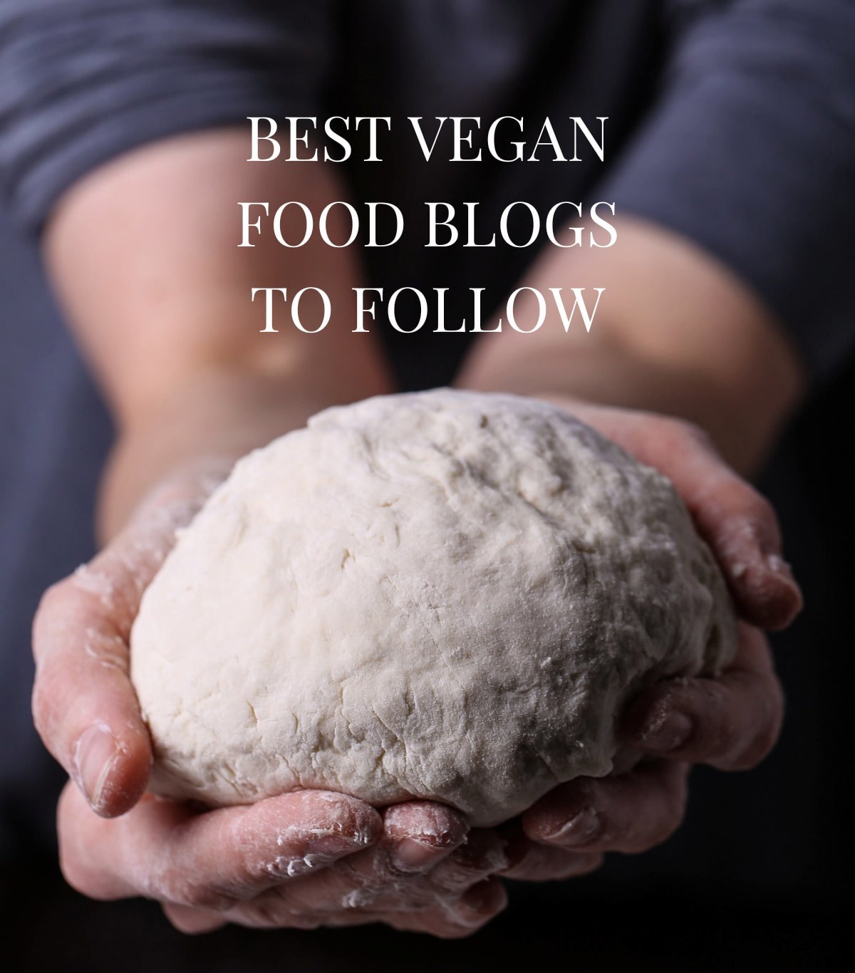 Two hands holding a ball of dough.