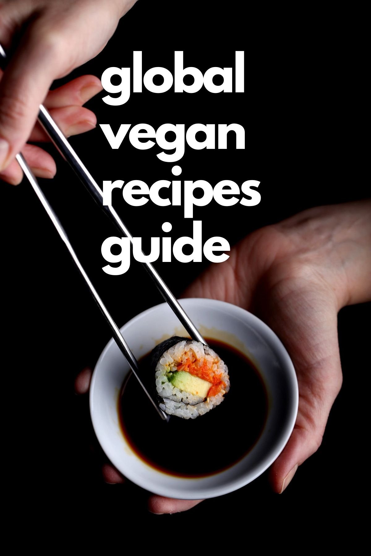 Chopsticks holding a piece of vegan sushi.