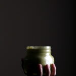 A jar of creamy poblano sauce.