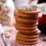 Dairy free, vegan cashew cheese on a stack of crackers.