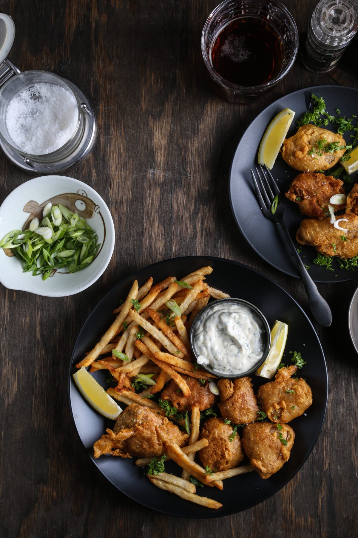 Vegan fish and chips on plates.