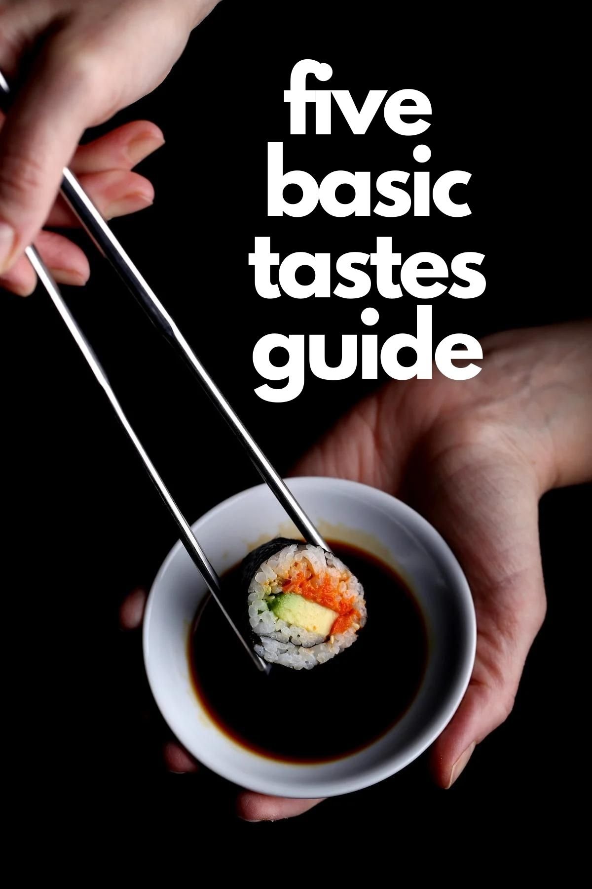 Chopsticks holding a piece of sushi.