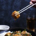 Overhead shot of General Tso’s tofu—crispy tofu coated in glossy sauce, paired with rice.