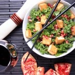 Raw Kale with Tofu Croutons and Pomegranate-Sesame Dressing
