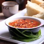 A small bowl of Thai sweet chili sauce.