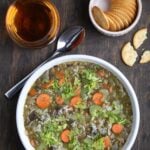 A bowl of vegan chicken and rice soup.