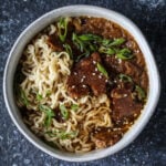 A bowl of vegan ramen with a homemade seitan recipe.